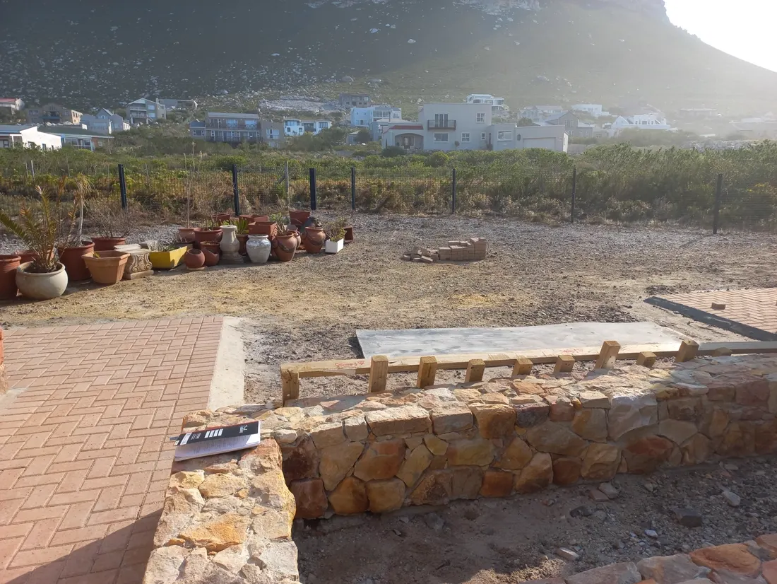 Before: Before and after of a stone seating area